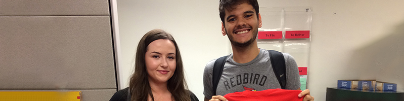 Two international students posing together.