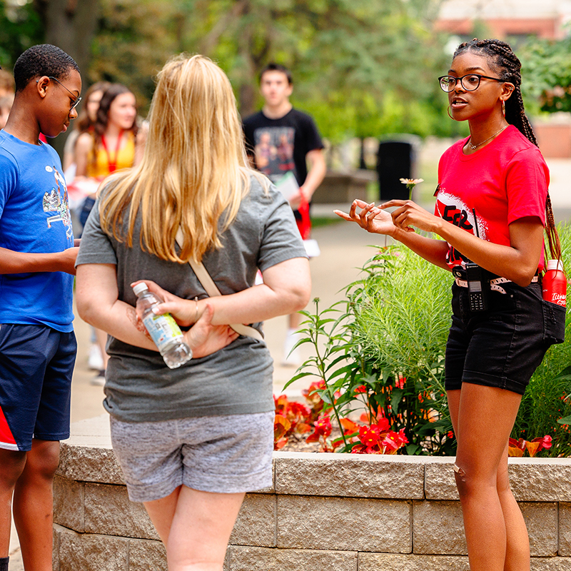 Students listing to a student worker during the campus tour.